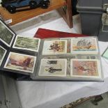 Approximately 800 large cigarette cards in 2 albums from a variety of manufacturers including