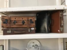 4 leather suitcases