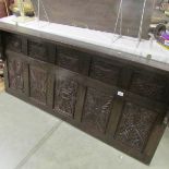 A late Victorian / early 20th century carved oak overmantel top