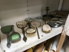 A good lot of vintage hairbrushes and mirrors etc.