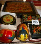 4 hand painted, signed and titled Russian lacquered boxes together with 2 painted lacquered eggs.