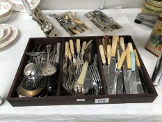 A large quantity of cutlery.