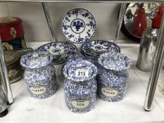 A mixed lot of blue and white including tea, coffee and sugar canisters.