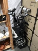 A golf bag and golf clubs.