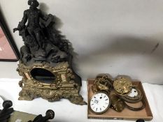 A French clock case and movements.