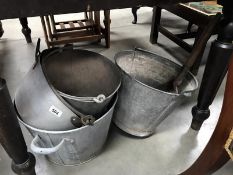 A quantity of galvanised buckets.