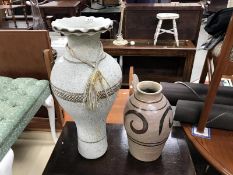 2 large pottery vases.