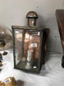 A Victorian copper wall mounted street lamp.