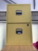 A 2 drawer yellow filing cabinet.