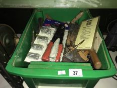 A box of assorted tools