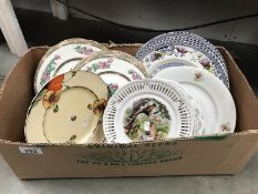 A box of assorted plates.