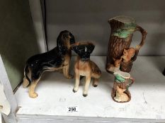 A Coopercraft bloodhound, a figure of a boxer dog, a large Hornsea jug and a small Hornsea jug.