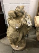 A garden statue of romantic couple