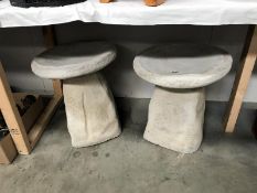 A pair of garden saddle stones.