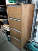 A 4 drawer filing cabinet.