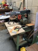 A Dewalt powershop radial arm saw.