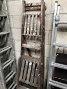 2 wooden step ladders.