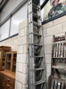 An extending aluminium ladder (3m - 5.44m) and 2 short aluminium ladders.