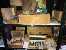 2 shelves of boxed tools including Fosner bits & router bits etc.