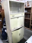 A vintage kitchen cabinet.