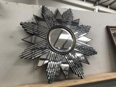 A good quality sunburst mirror.