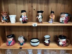 2 shelves of Toby and character jugs including Shorter.