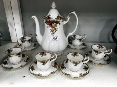 A Royal Albert Old Country Roses coffee pot together with 6 coffee cups and saucers.