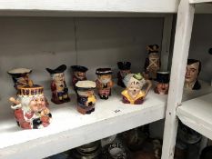 A shelf of Toby and character jugs including Shorter.