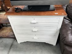 A painted 3 drawer chest.