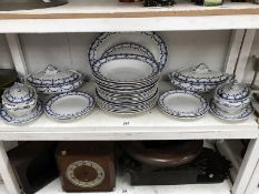 A blue and white dinner set.