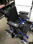 A motorised Wheeltech wheel chair.