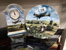 A royal Doulton 'Spitfire Coming Home' collector's plate and a Bradex 'Heroes of the Sky' clock.