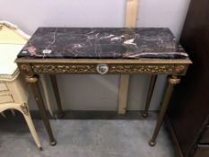 A gilded marble topped console table.