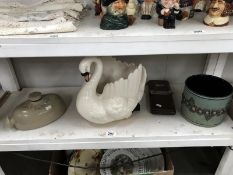 A Swan planter, a stoneware hot water bottle and 2 other items.