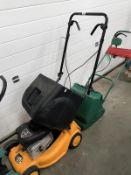 A Briggs and Stratton 148cc petrol lawn mower.