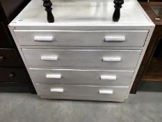 A 4 drawer painted chest.