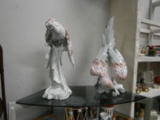 A pair of large Italian ceramic parrots.