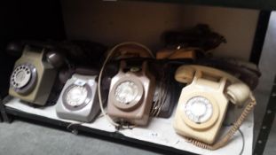 A Shelf Of Vintage Telephones