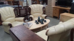 A 3 piece suite - 2 seater sofa and 2 chairs