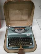 A portable typewriter.