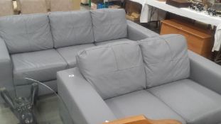 A grey 3 seater settee and a matching 2 seater settee
