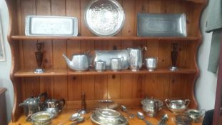 A collection of silver plate items including a retro tea set, candlesticks etc.