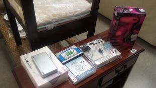 A quantity of miscellaneous including Nintendo DS Lite, electronic Suduko same, new hairdryers,
