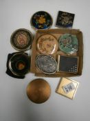 A collection of compacts including Stratton