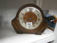 A Frank Stewart oak mantel clock