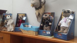 A quantity of meerkat stuffed toys