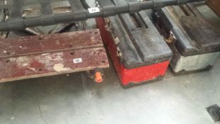 A Workbench And 2 Tool Boxes With Contents