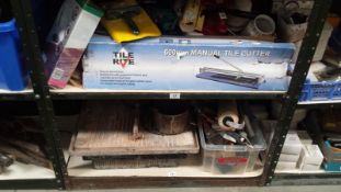 2 Shelves Of Decorating Items Inc. Tile Cutters etc.