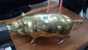 A Large Brass Pig Money Box