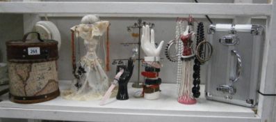 A collection of costume jewellery and stands etc